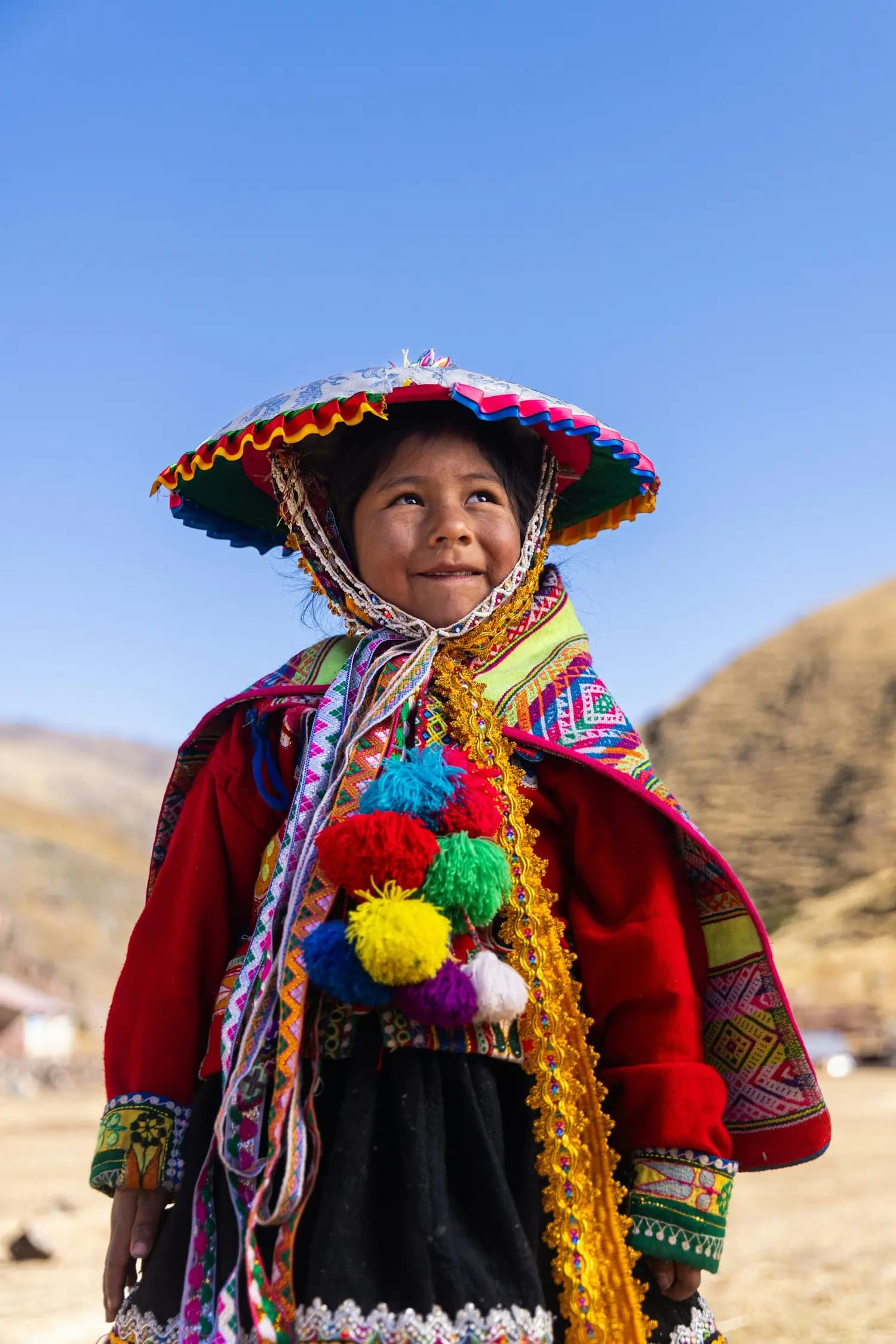 A young girl in traditional Andean dress