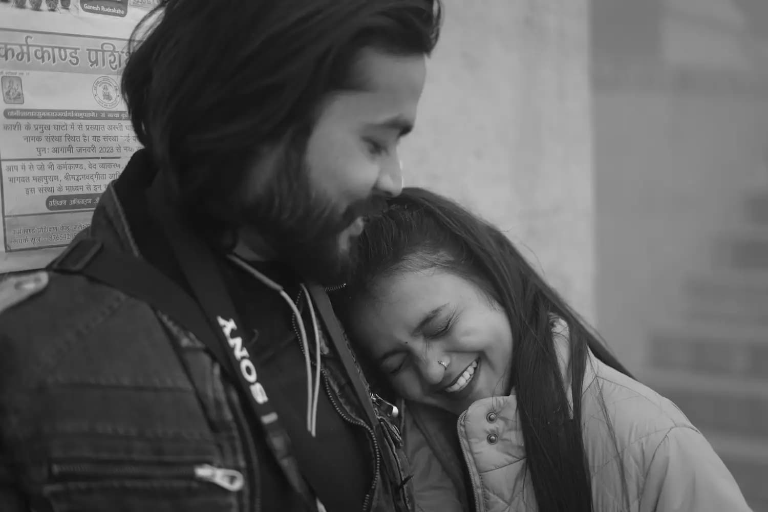 A couple, heads close together