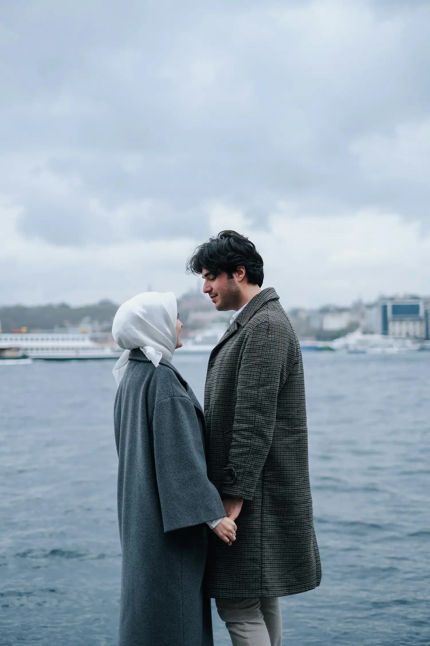 A couple by the water
